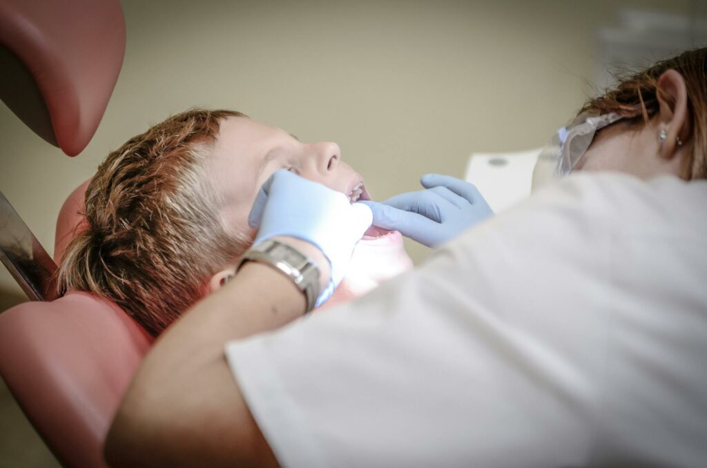 Boy getting dental services 